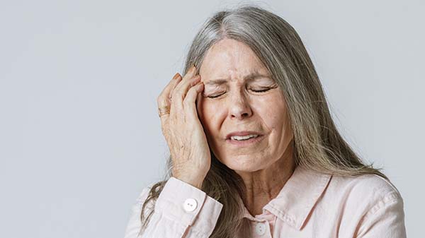 Sick Senior Woman Having Headache During Coronavirus Pandemic